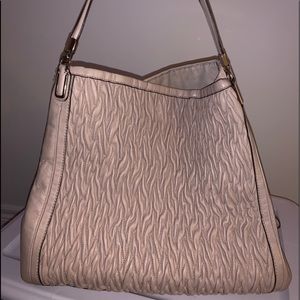 Beige shoulder Coach purse